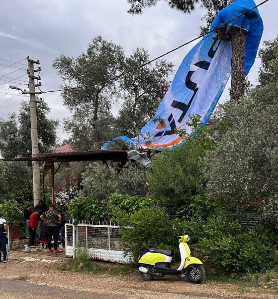 FETHİYE’DE OLUMSUZ HAVA KOŞULLARI PARAŞÜTÇÜLERİ KÖTÜ ETKİLEDİ